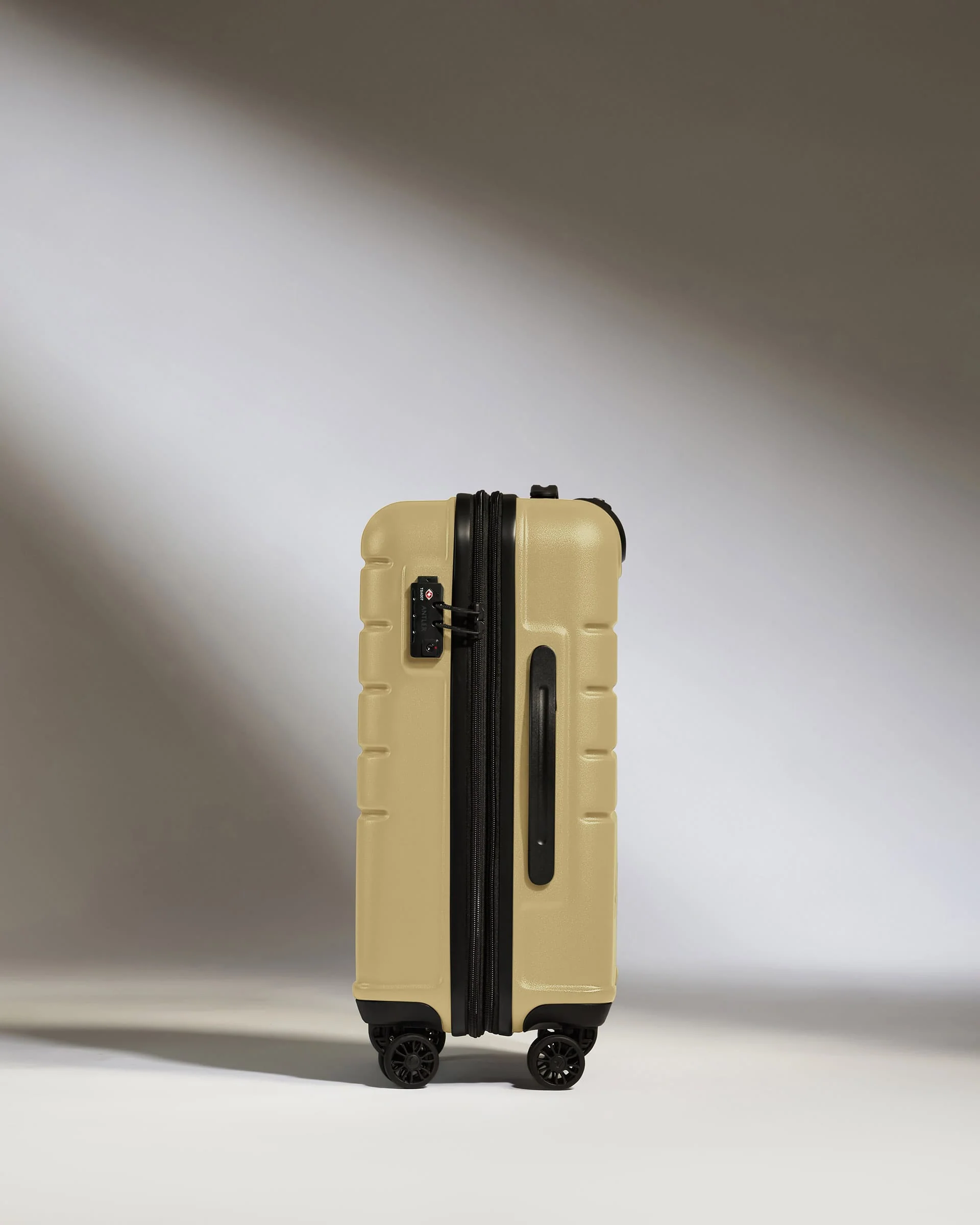 Cabin Suitcase in Dark Sand - Logo - Image 5