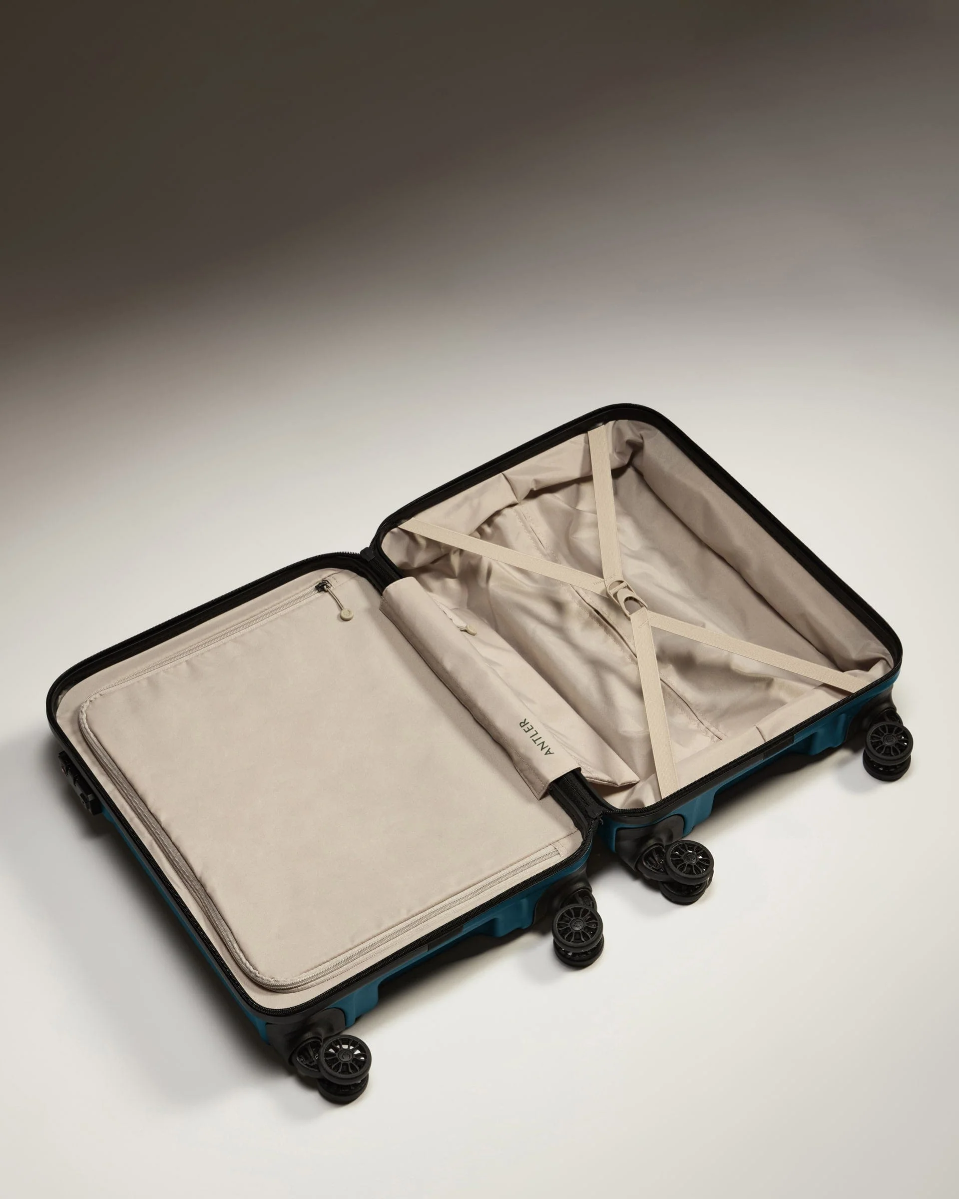 Cabin Suitcase in Soft Blue - Logo - Image 4