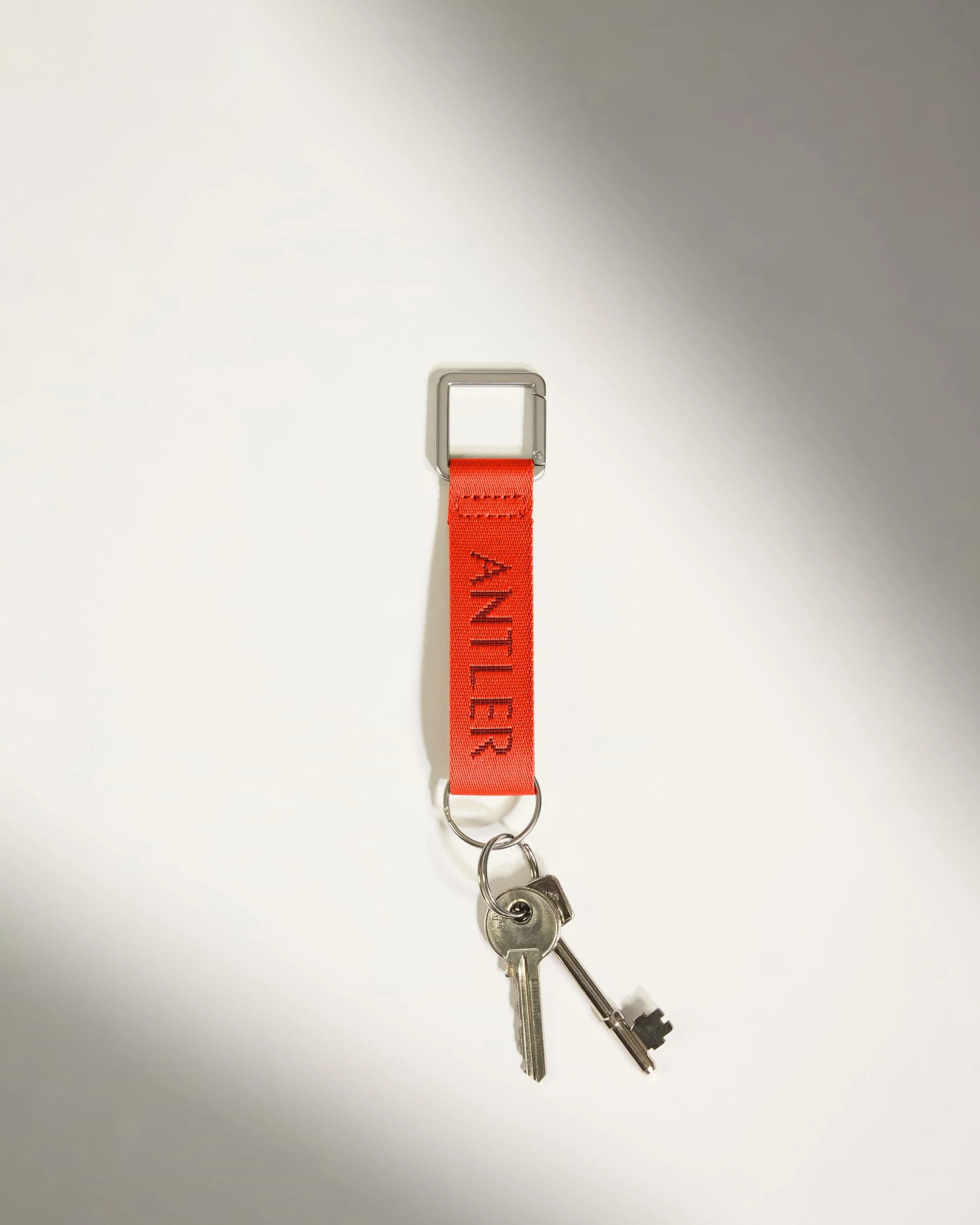 Icon Keyring in Coral