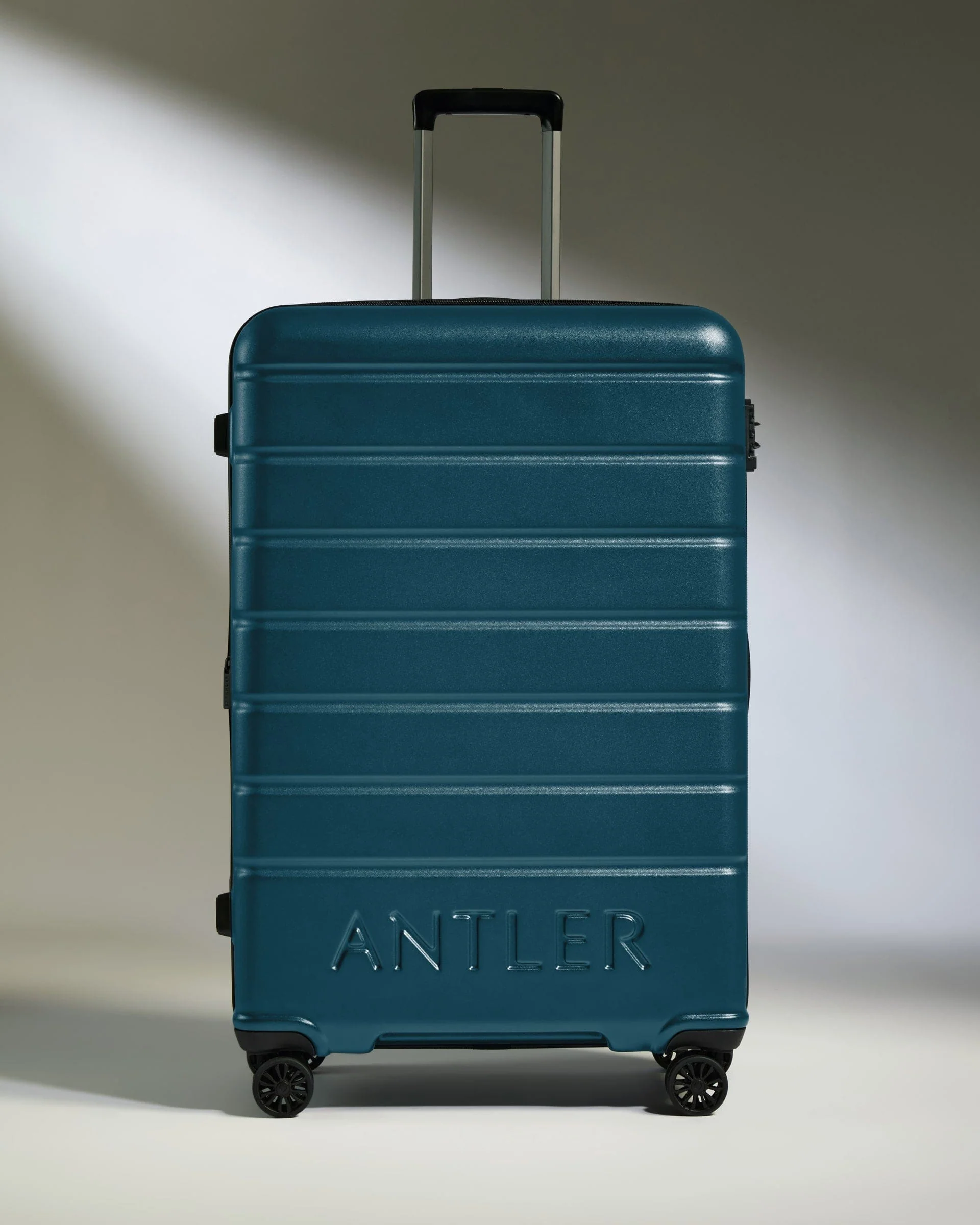 Large Suitcase in Soft Blue - Logo - Image 2