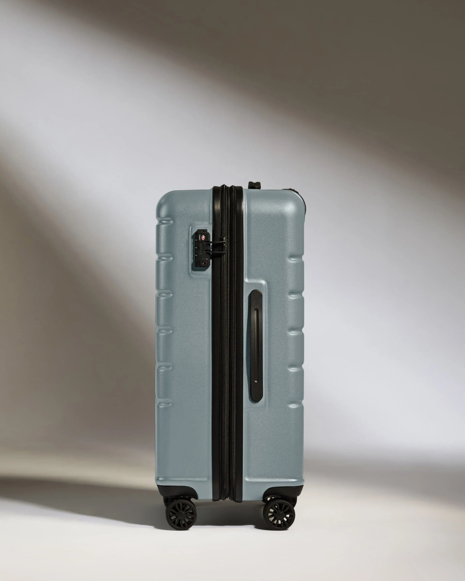 Medium Suitcase in Cool Grey - Logo - Image 4