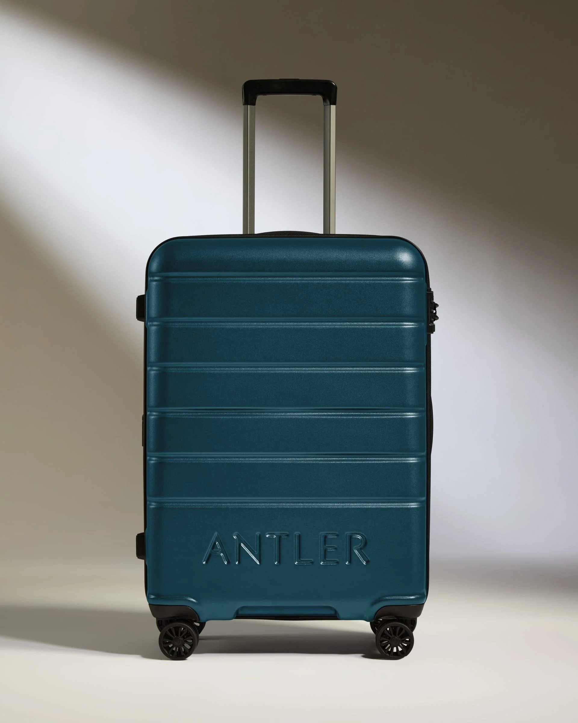 Medium Suitcase in Soft Blue - Logo - Image 2